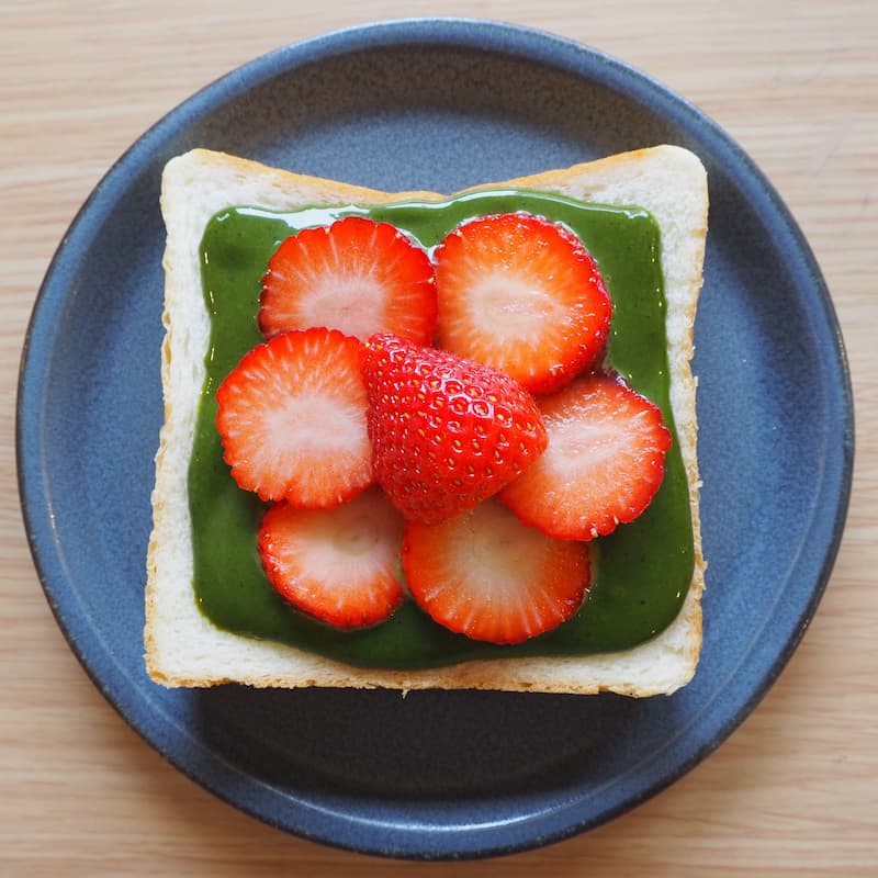 A slice of shokupan with strawberries